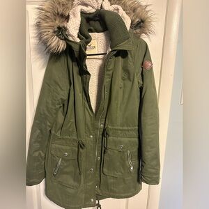 Forest green parka with faux fur hood